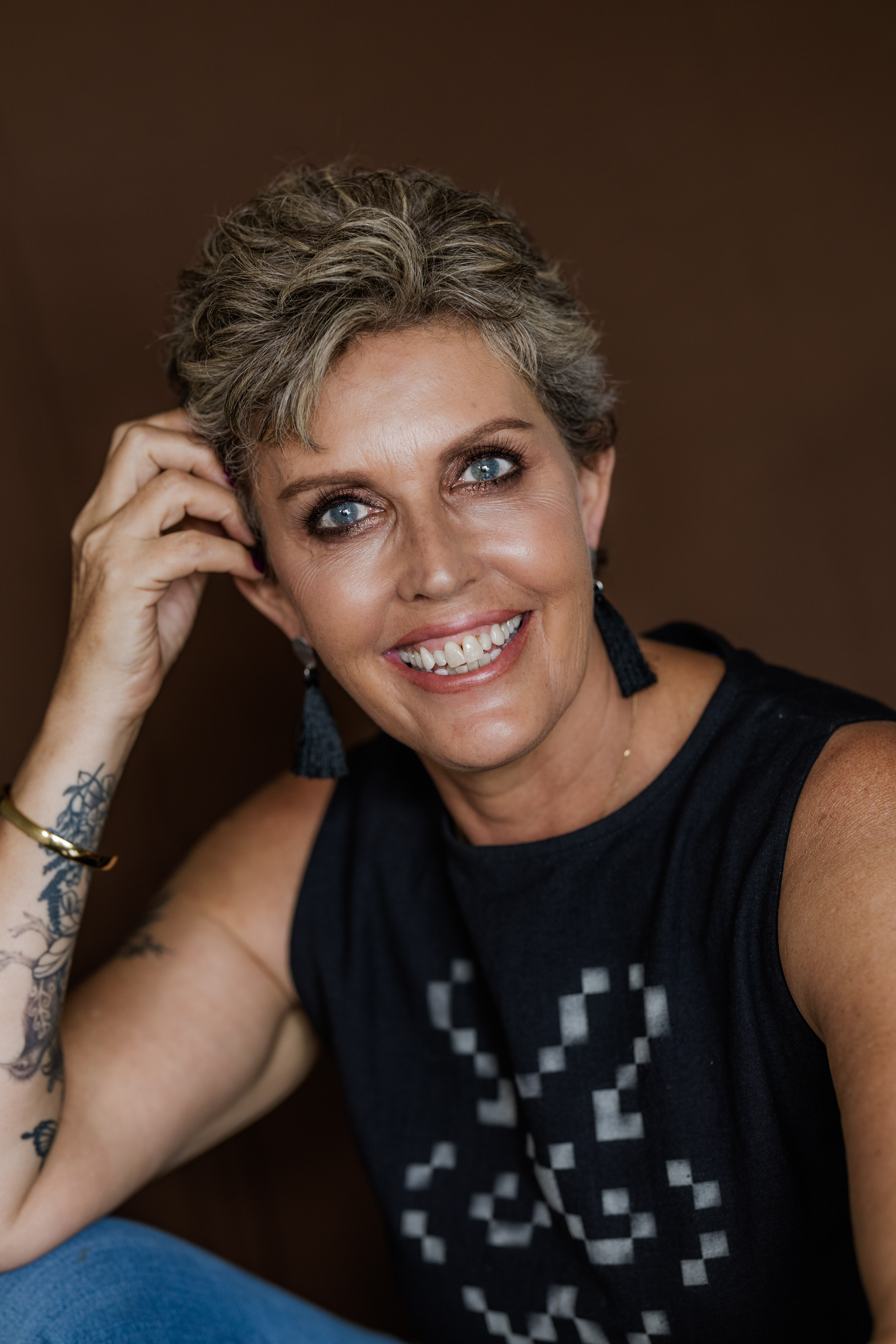 Tania Thomson relaxed on veranda with morning tea